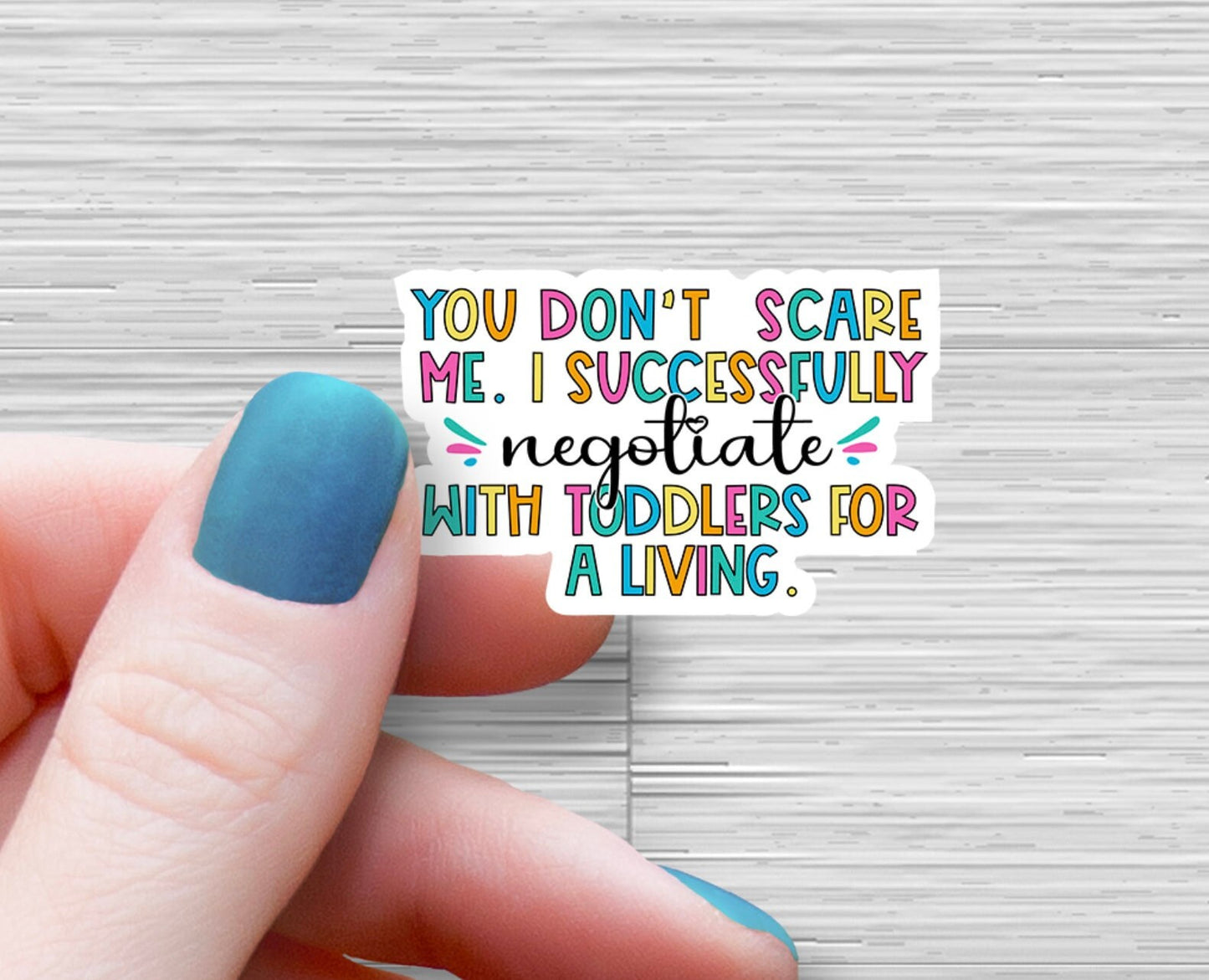 You don’t scare me. I successfully negotiate with toddlers for a living. Sticker Nanny Teacher Educator Sticker Pre K Prek Sticker Funny
