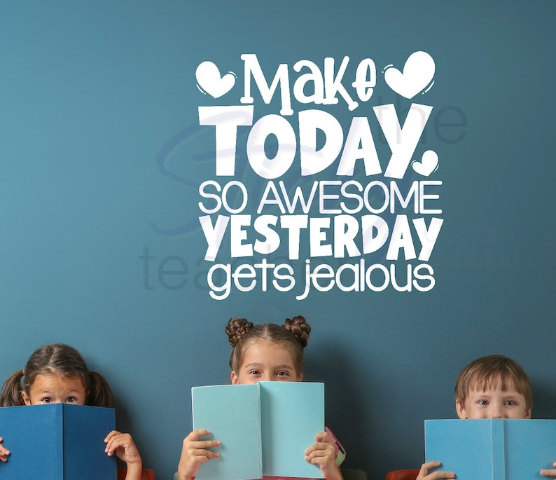 Children reading near motivational quote wall decal