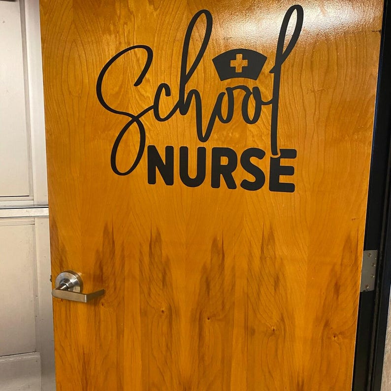 School Nurse decal on polished wood door