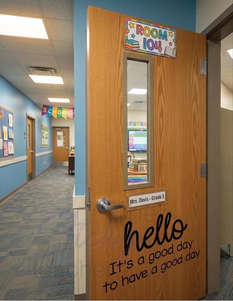 Hello It's a Good Day decal on wooden classroom door with Room 104 sign and Mrs Davis Grade 3 nameplate