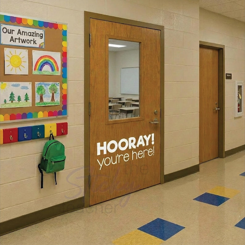 HOORAY you're here classroom door decal in hallway