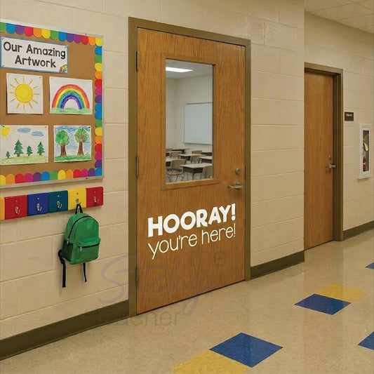 HOORAY you're here classroom door decal in hallway