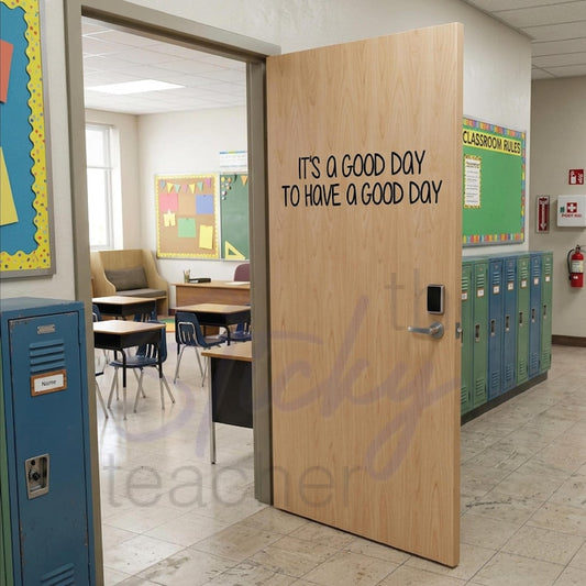 It's a Good Day to Have a Good Day classroom door vinyl decal on light wood door with blue lockers