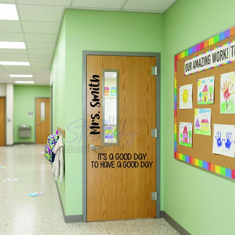Personalized classroom door decal reading Mrs. Smith in script font on wooden door