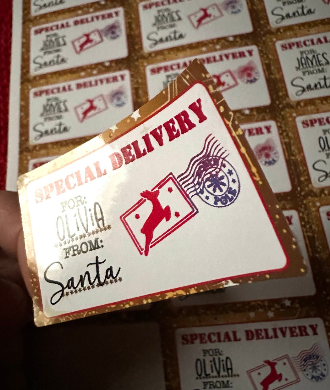 Gold Special Delivery tag with reindeer and North Pole stamp