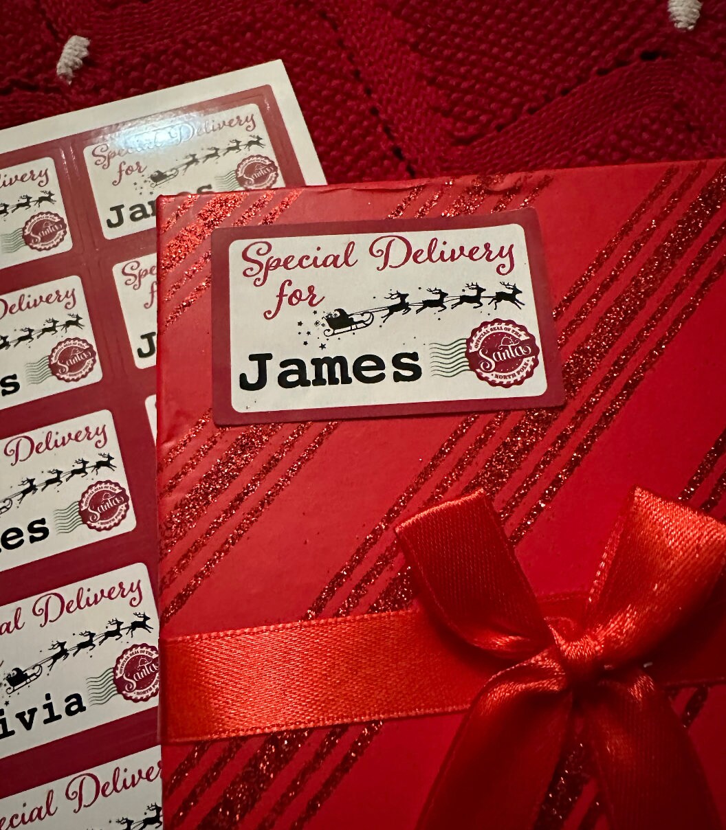 Special Delivery for James label on a red gift box