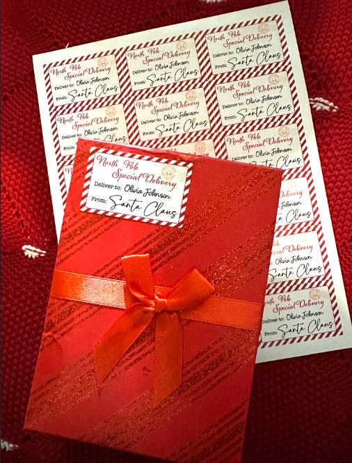 Sheet of North Pole Special Delivery labels with a red gift box